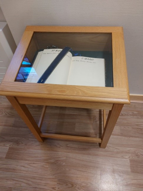 Book of remembrance in glass case