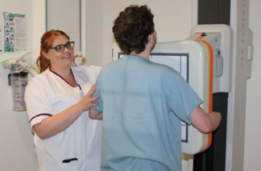 Radiographer performing examination