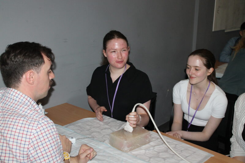 Students learning from an interactive radiology session