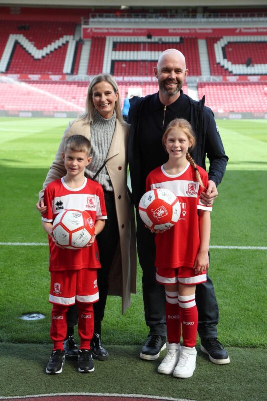 Middlesbrough Football Club mascots Ava and Lucas Neal, along with Chris and Sarah